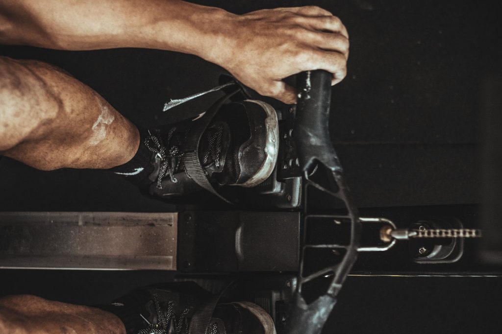 man using stationary bike